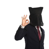 匿名係長がOKサインを出すビジネスマン、スーツ姿で承認ポーズの写真