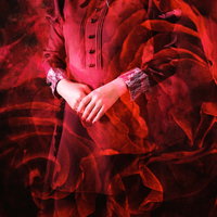 赤い薔薇に手を添える女性のフォトモンタージュの写真