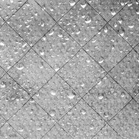 窓ガラスに付いた雨粒のテクスチャーの写真