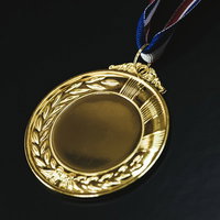 安っぽい金メダルの写真