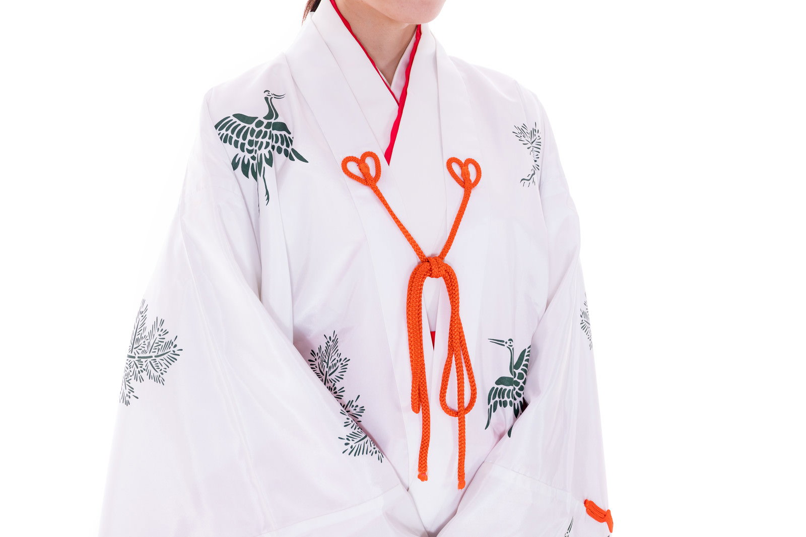 Woman in miko priestess attire wearing a white chihaya with a red cord