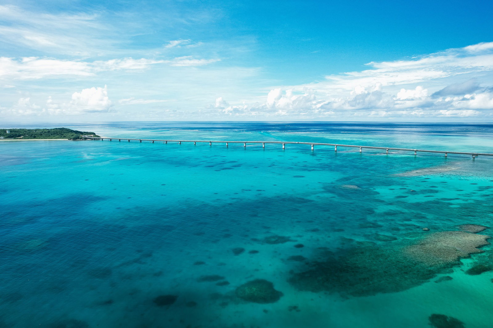 The Irabu Bridge spanning the transparent, emerald green sea