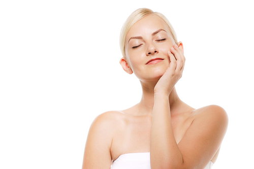 歯痛で頬に手を当てるロシア人美女のポートレート