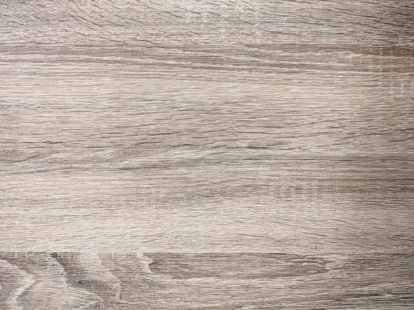 グレージュ系の色合いをした薄汚れた木目板のテクスチャー