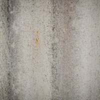 錆と汚れが付着した古い板のテクスチャーの写真