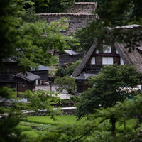 山奥から相倉集落の合掌造りを望遠レンズで狙うの写真