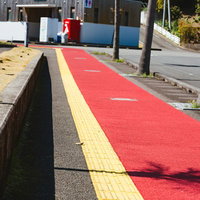 天福球場まであと一息！ 油津駅から続くカープ一本道の写真