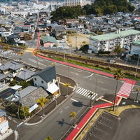 宮崎県日南市油津の街並みと赤い歩道 空撮の写真