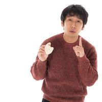 「もうひとつください」と注文する肉まんマニアの写真