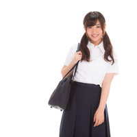 いつも笑顔の女子マネ、白いシャツに紺色スカートの写真