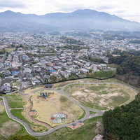 福岡県直方市の中央公園と住宅地の空撮風景の写真