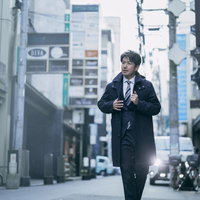 顧客接待を終えて帰路につくM&Aアドバイザーの写真