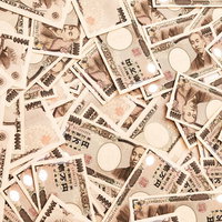 床一面に散らばった壱万円札と福沢諭吉の肖像の写真