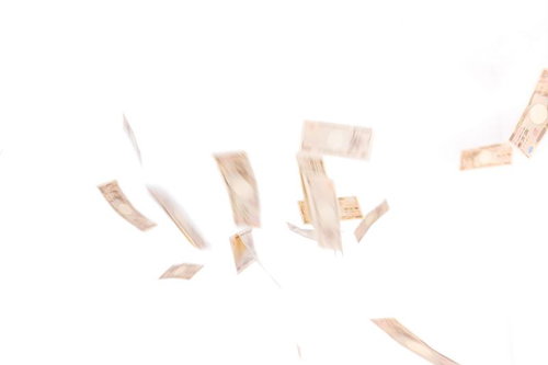 空中にばらまかれた一万円札が舞い散る風景