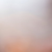 暖色系の柔らかな丸ボケ光のテクスチャーの写真