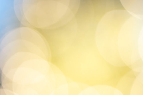 黄金色に光る丸ボケのグラデーション背景