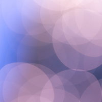 紫とピンク色のグラデーション丸ボケ光のテクスチャー背景の写真