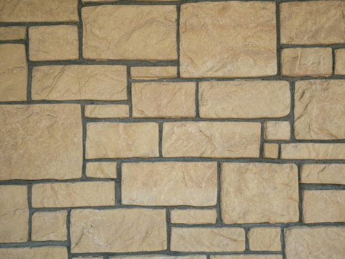 大小不揃いの長方形タイルが敷き詰められた壁面のテクスチャー