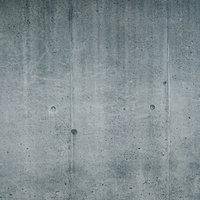 汚れやシミが付いた殺風景なコンクリート壁のテクスチャーの写真