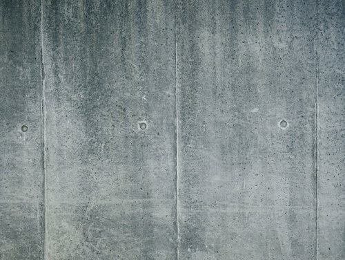 薄汚れた殺風景なコンクリートの壁面テクスチャー