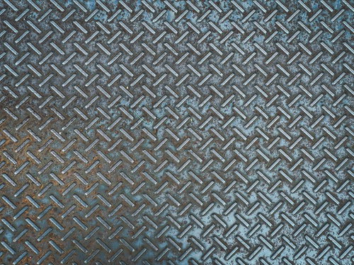 くすんだ金属チェッカープレートのテクスチャー