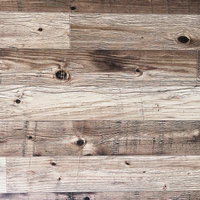 大小の節と木目が入ったベニア板のテクスチャーの写真