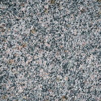 グレー系石材タイルで敷き詰められた床のテクスチャーの写真