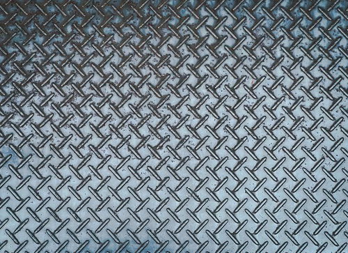 跡が残るチェッカープレートのテクスチャー