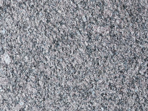 埃一つない清潔なグレーの石材タイルのテクスチャー