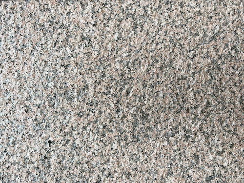 グレーの石材タイルの表面テクスチャー