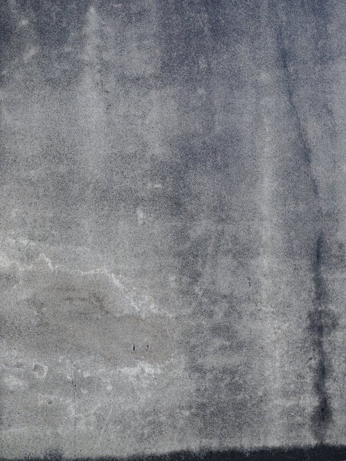 水染みが付いた古いコンクリート擁壁のテクスチャー