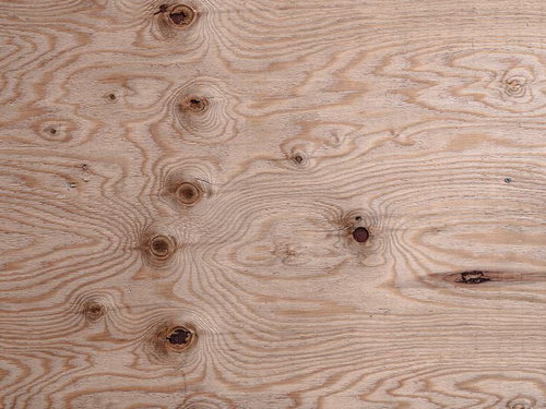 波状に広がる節のテクスチャー、ベニア板の木目