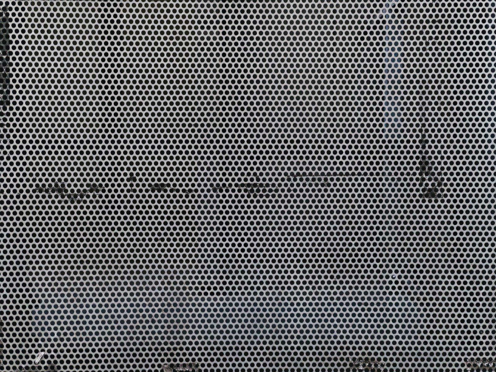 規則的な穴が開いたアルミパンチング板の金属テクスチャー