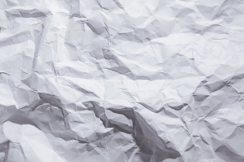 ポリゴン状のシワが立体的に入った紙のテクスチャー