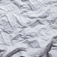 しわくちゃでくしゃくしゃの紙のテクスチャーの写真