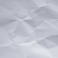 シワが入ったくしゃくしゃの白い画用紙の質感の写真
