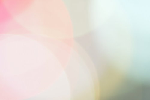 柔らかなネオンの光が混ざり合うライトアップの抽象背景