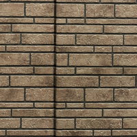 茶色のレンガ調タイル壁と継ぎ目のテクスチャーの写真