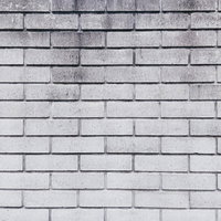 グレーのレンガ調コンクリート壁のテクスチャーの写真