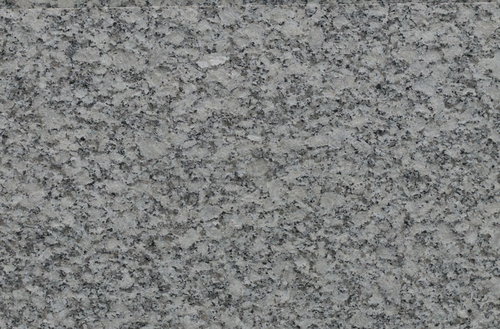グレーベースの斑模様が特徴の石材タイルの表面テクスチャー