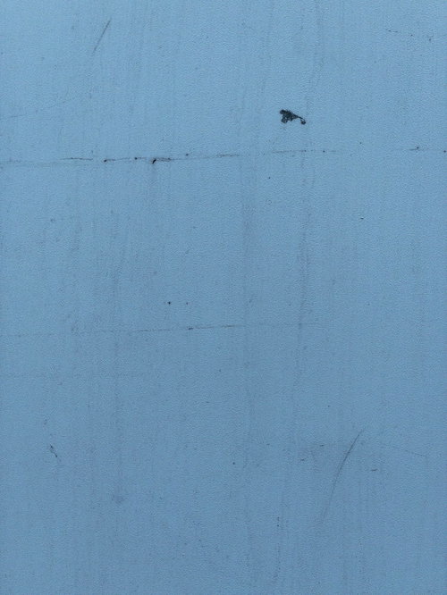 青みがかったコンクリートの壁テクスチャー