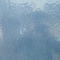 凸凹のくもりガラスの表面テクスチャーの写真
