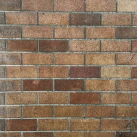 薄汚れた煉瓦の壁のレンガテクスチャーの写真