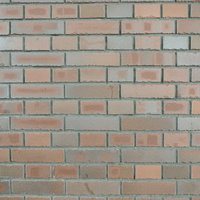 ガタガタしているレンガ壁の質感と凹凸の表情の写真