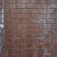 汚れが流れ落ちるレンガ壁のテクスチャーの写真