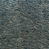 粗いコンクリート質感の擁壁ブロック表面テクスチャの写真
