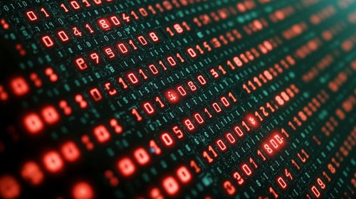 赤く光るデジタルコードとバイナリ数列のサイバー空間