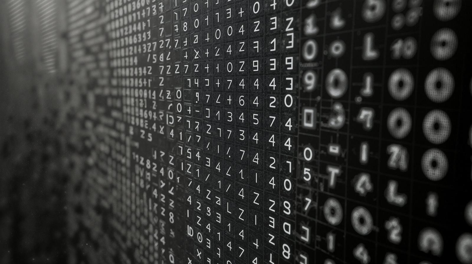 黒背景に白い数字とアルファベットが無数に並ぶデジタルコード