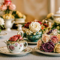 庭園の花に囲まれた紅茶とティーカップで過ごすガーデンブレイクの写真