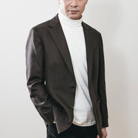 高学歴感漂う代表取締役社長のジャケット姿の写真